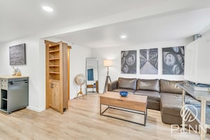 Enjoy your morning coffee or a quiet evening in this welcoming and stylish living area.
