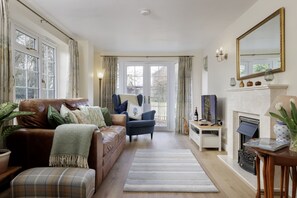 Natural light fills the dual aspect sitting area