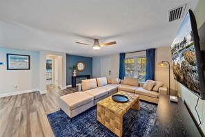 Sink into our comfy sofa and enjoy endless entertainment on the big screen.
