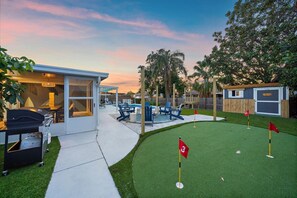  Fun for Everyone! Putt-putt, a playhouse for the little ones, and a BBQ grill for the perfect outdoor feast.