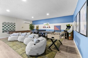 Game On! Challenge friends and family to a friendly match on our ping pong table, arcade games, foosball, and shuffleboard.