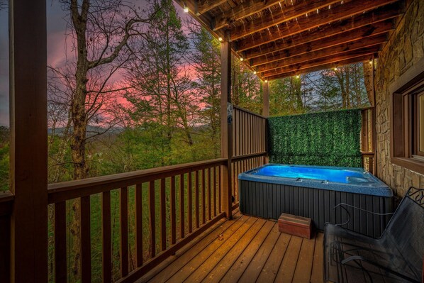 Relax and take in the beauty of the great outdoors from this private deck.