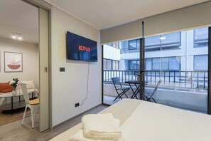 Enjoy a cozy retreat with Netflix and a charming balcony. Perfect for relaxation after a day of adventure!