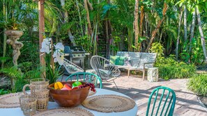 Your private outdoor paradise awaits! Lounge by the large heated pool, surrounded by lush tropical landscaping, or enjoy alfresco dining on the covered patio. With a gas grill, bistro set, and sun loungers, relaxation is guaranteed.