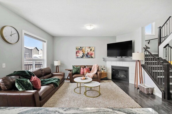 Relax and get cozy near the gas fireplace, while watching Netflix with your family and friends!