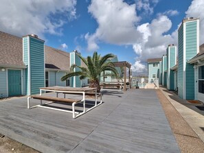 Enjoy outdoor dining at the picnic tables right in front of the condo!