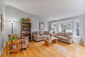 The light-filled living room is a great spot for quiet conversation and relaxing. 