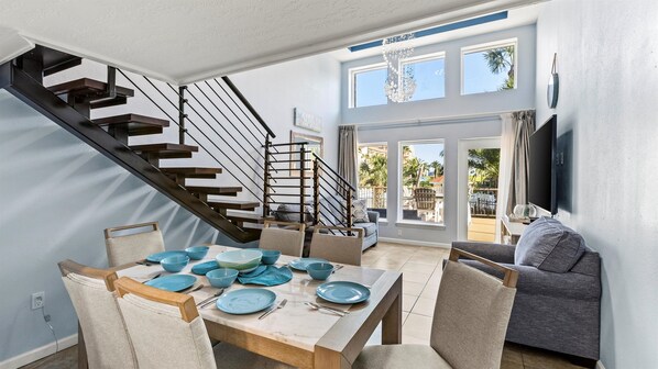 Kitchen conveniently next to dining table.