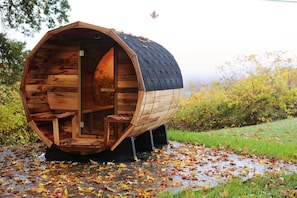 Outdoor sauna with scenic landscape