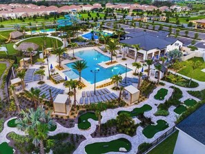 The Retreat Clubhouse!! Less than 1/2 mile from the house, easily walkable. Featuring waterpark style slides, zero entry pool, bar/restaurant, putt-putt golf ($) and more!! FREE ACCESS FOR ALL GUESTS!
