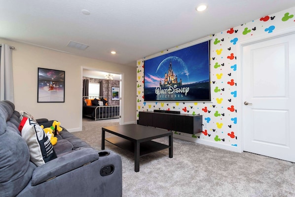 Upstairs loft with HUGE projector screen makes movie night a blast!