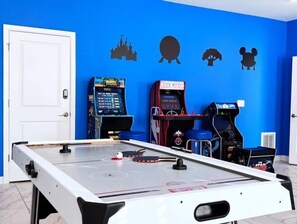 Super cool game room with multi player arcade games and air hockey!