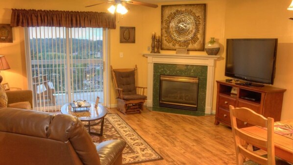 Whispering Pines 141 with Free Dollywood Ticket - Spacious Living Room with Gas Fireplace, Sleeper Sofa and SMART TV with Cable & WIFI throughout vacation rental