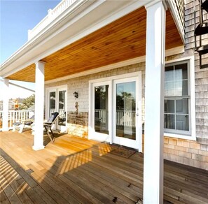3rd floor private deck with views of NPT Harbor and Fort Adams.