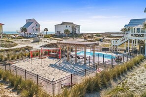 From the pool, volleyball courts straight to the beach just steps away. Your dream vacation is calling!