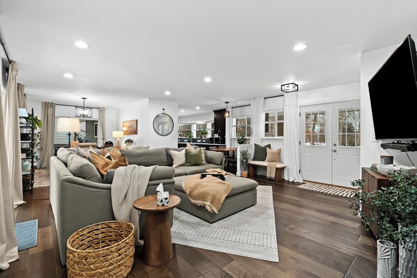 Spacious living room featuring a smart TV for your entertainment.
