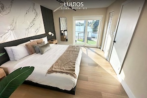 Serene bedroom with lake views.