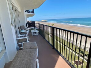 Large oceanfront balcony with great seating & panoramic ocean and beach views!