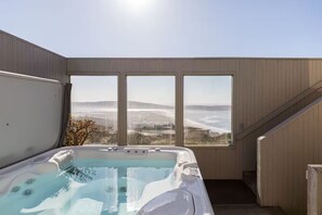 Welcome to The Point! Enjoy the hot tub with stunning ocean views.
