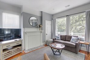 Cozy and stylish, the living room is the perfect spot to unwind.