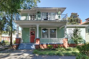 Step into history with this charming light green exterior, radiating timeless appeal and classic Savannah vibes.