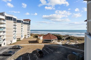 Balcony views that overlook the heated, covered pool, offering a perfect place to relax and unwind