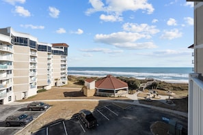Balcony views that overlook the heated, covered pool, offering a perfect place to relax and unwind