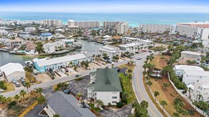 Great aerial view of the Island Home complex and the surrounding area, the marina just to the east.