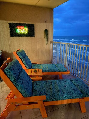 Tacos & Tequila neon sign and ocean waves