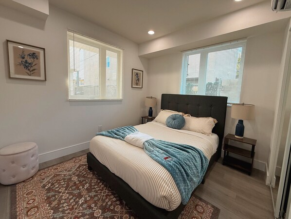 Bedroom one with smart TV