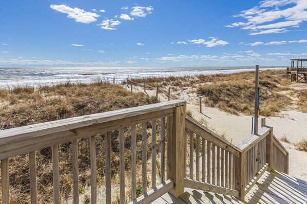 Access to the gorgeous beach is right off the deck