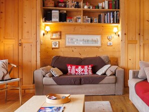 Furniture, Interior Design, Wood, Flooring, Room, Floor, Couch, Ceiling, Living Room, Lighting