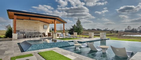 Movie nights under the stars—viewable from the pool!