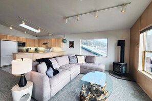 Plenty of space to relax and cozy up to the fire.
