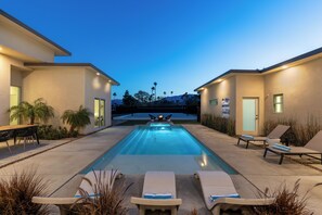 Gorgeous courtyard with pool and waterfall spa