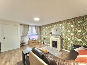 Spacious living area with comfy sofas