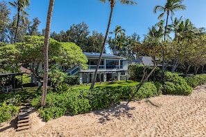 Step onto the sandy shore just outside your door and soak in the beauty of island living.