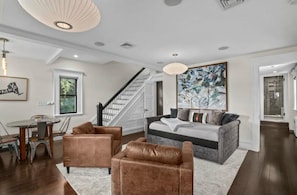 Cozy living space with elegant furnishings and plenty of natural light.