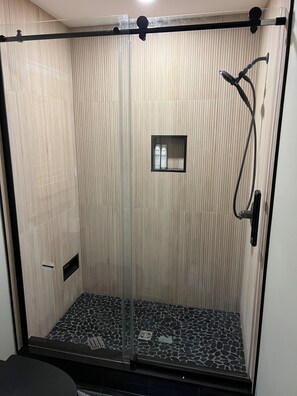 Primary en-suite with custom walk in shower 