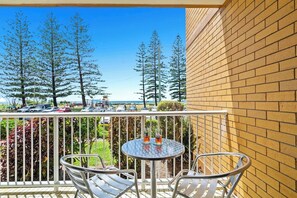 Start your day with coffee or wind down with a glass of wine at the bistro-style seating for two, all while soaking in ocean views.