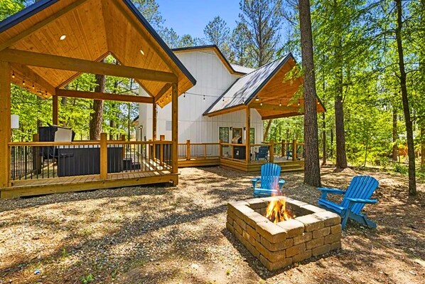 Cozy up by the fire and toast some marshmallows in this dreamy outdoor space