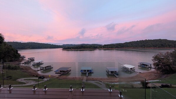 Unwind and relax with panoramic views of the serene lake with all glass railings