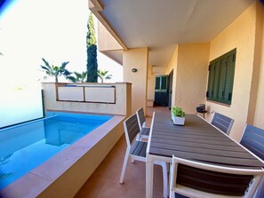 Large terrace equipped with a table for outdoor dining, barbecue and a small swimming pool ideal for cooling off in summer. In addition, the water can be heated in winter, so you can enjoy this space at any time of the year.