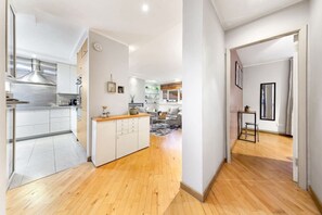 Enjoy cooking in this bright, fully stocked kitchen with plenty of counter space.