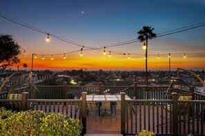 Sunsets from the deck with outdoor seating and dining