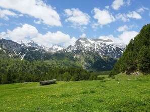 Sky, Mountain, Mountainous Landforms, Grass, Nature, Natural Environment, Cloud, Natural Landscape, Mountain Range, Hill