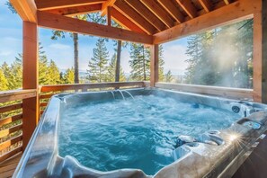 Hot Tub: Covered for all season comfort with stunning views :)