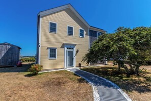 Beautiful three-bedroom home right on Chipmans Cove in the Indian Neck area of Wellfleet
