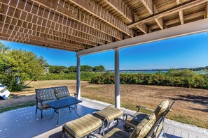 Patio below deck is a shady spot to relax and enjoy the view