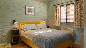 The master bedroom is bright and welcoming